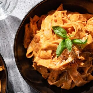 creamy tomato pasta in bowl FI