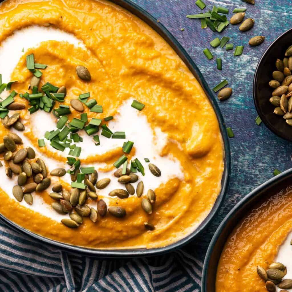 pumpkin and sweet potato soup in two bowls