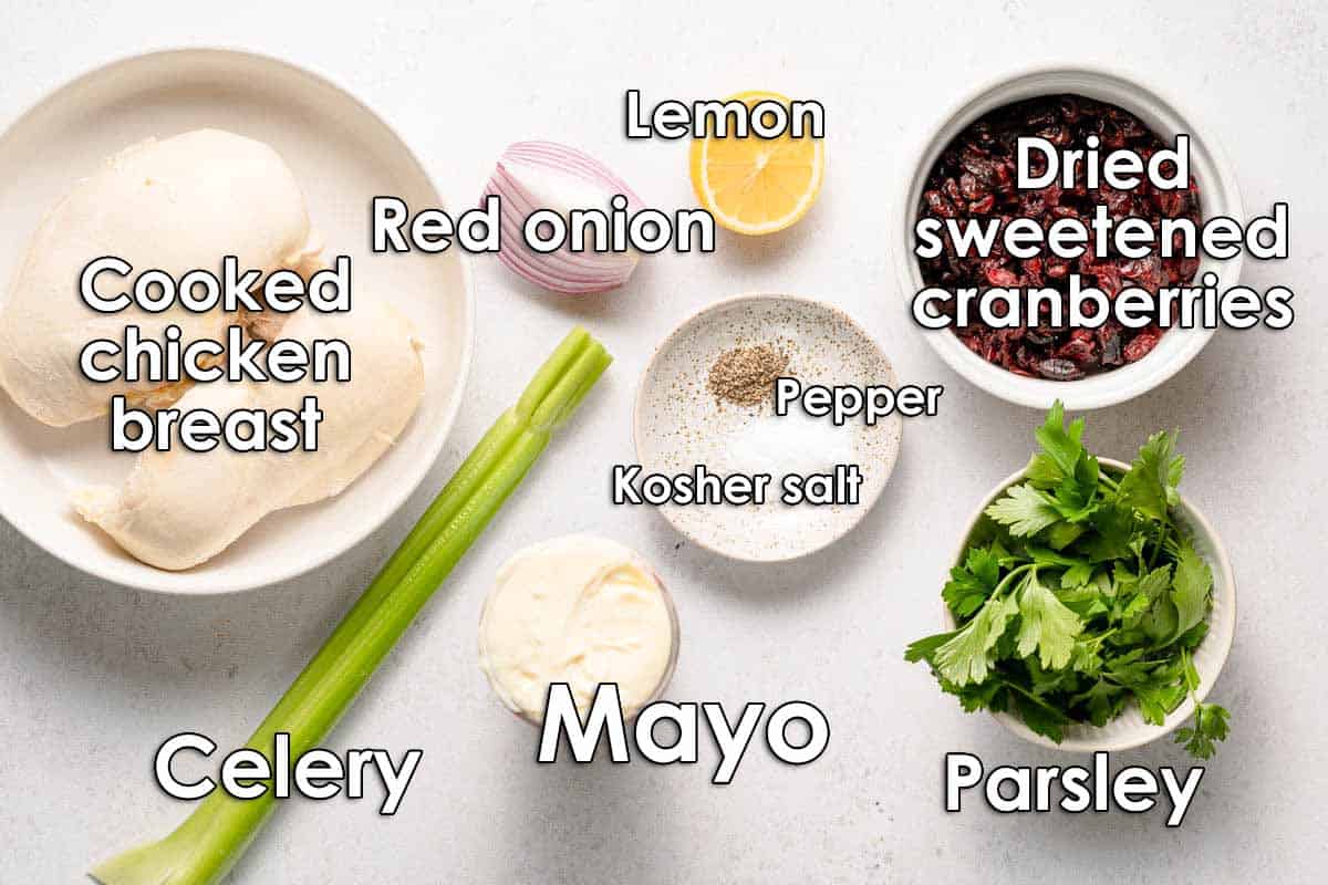 ingredients for cranberry chicken salad recipe with text labels.
