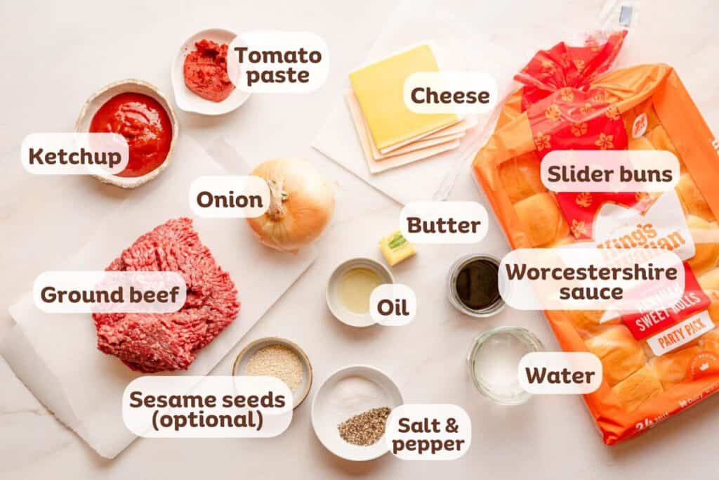 ingredients for sloppy joe sliders recipe laid out on white surface with text labels.