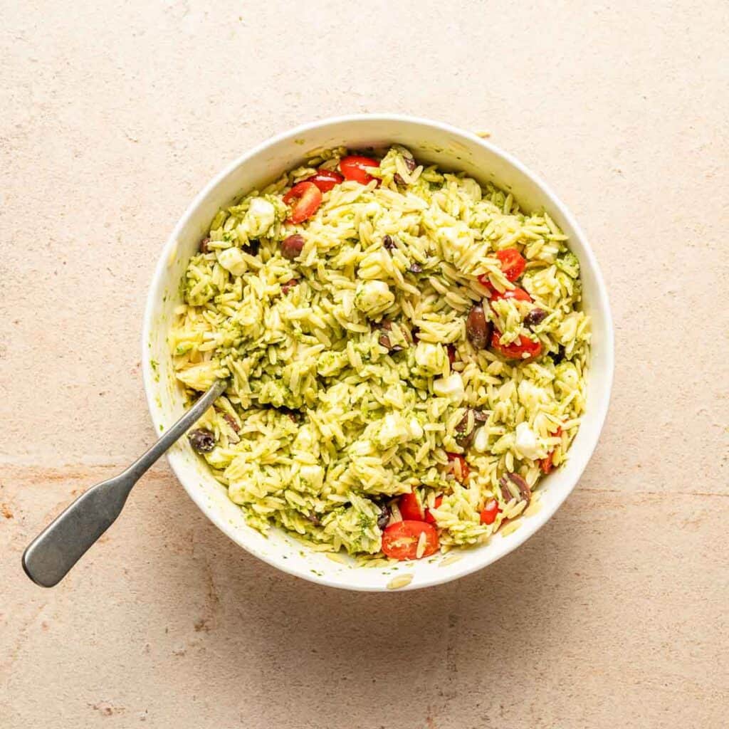 orzo pesto salad in bowl.