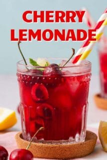 glass of cherry lemonade with two straws and recipe title at the top..