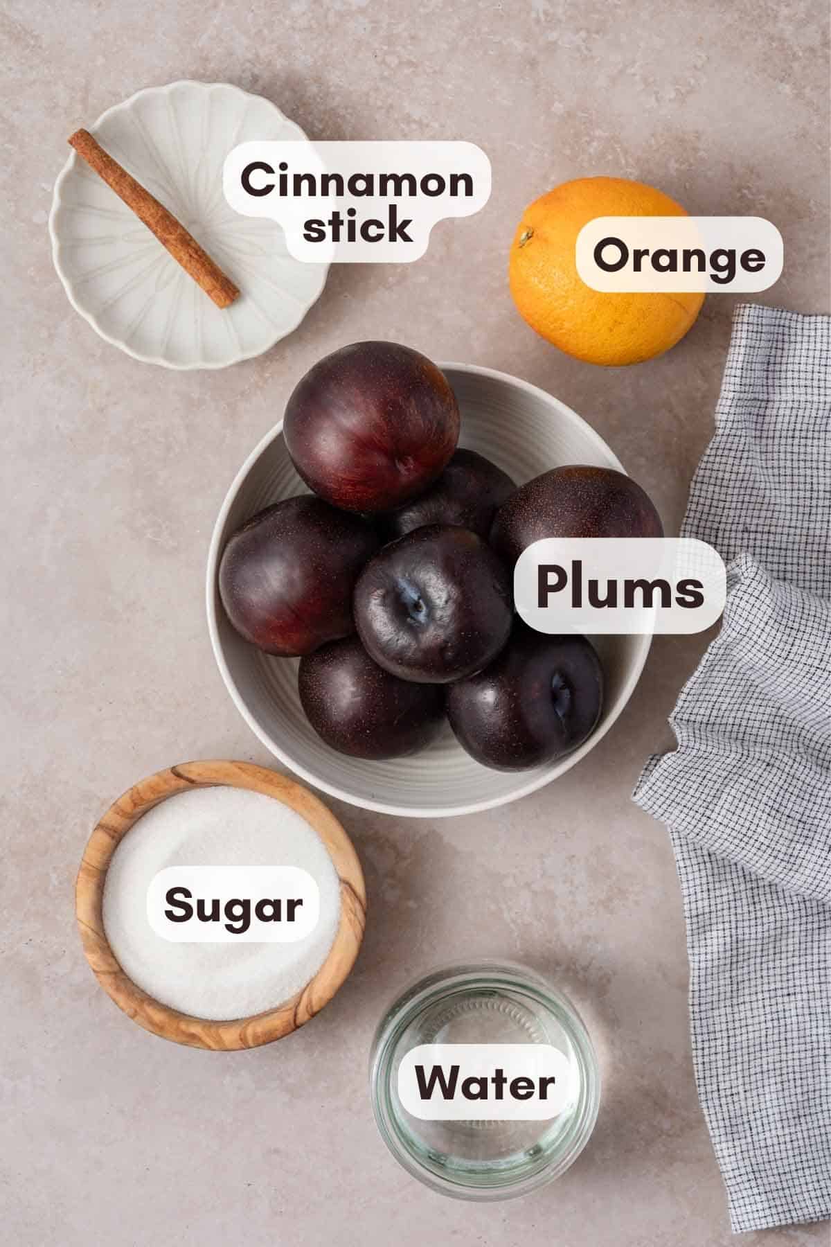 ingredients for stewed plums recipe with text labels.
