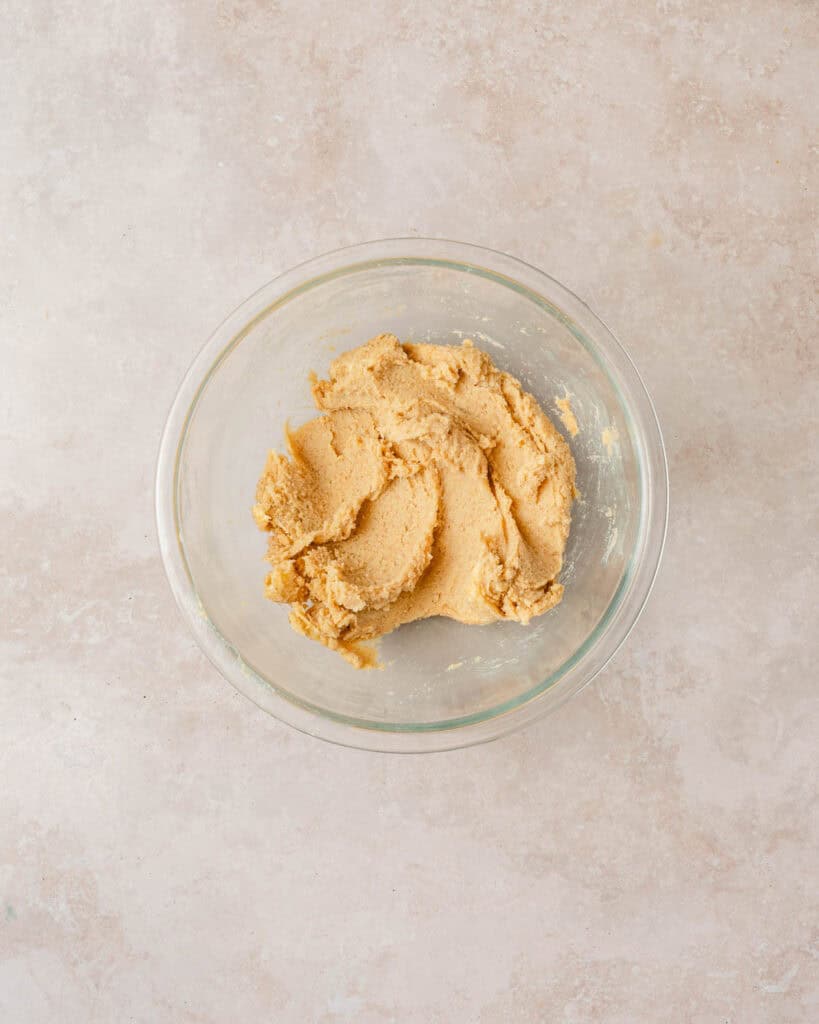 butter rand sugars creamed in bowl.