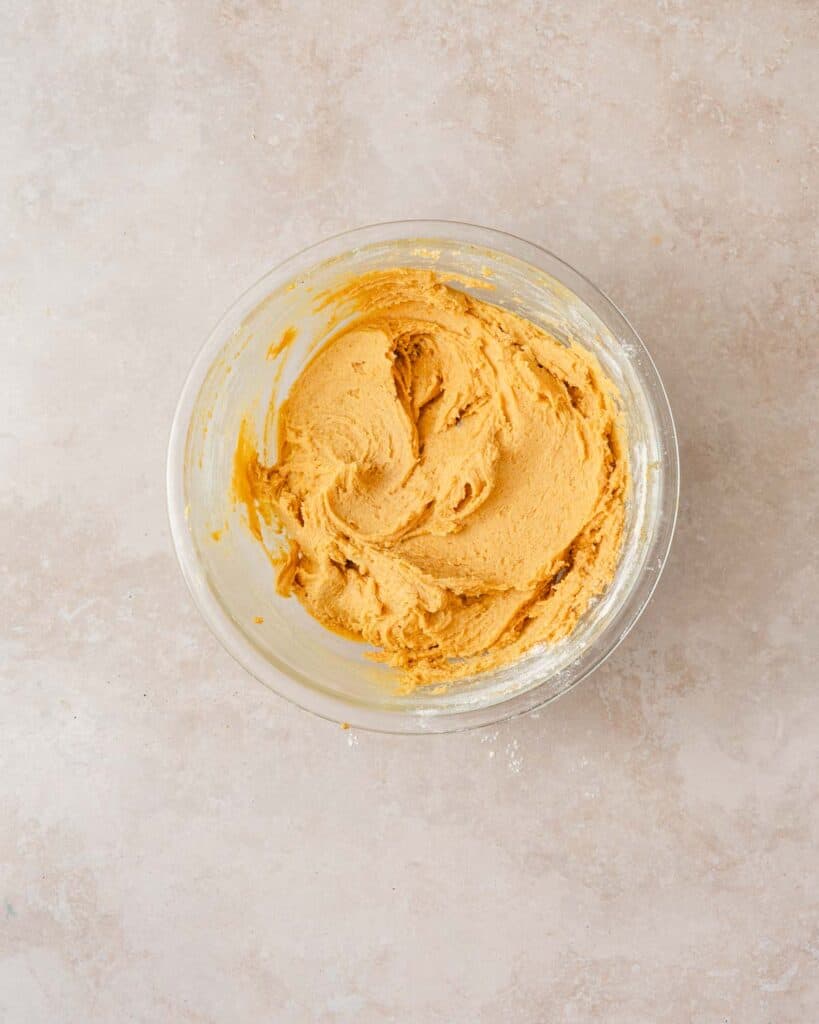 pumpkin cookie dough in bowl.