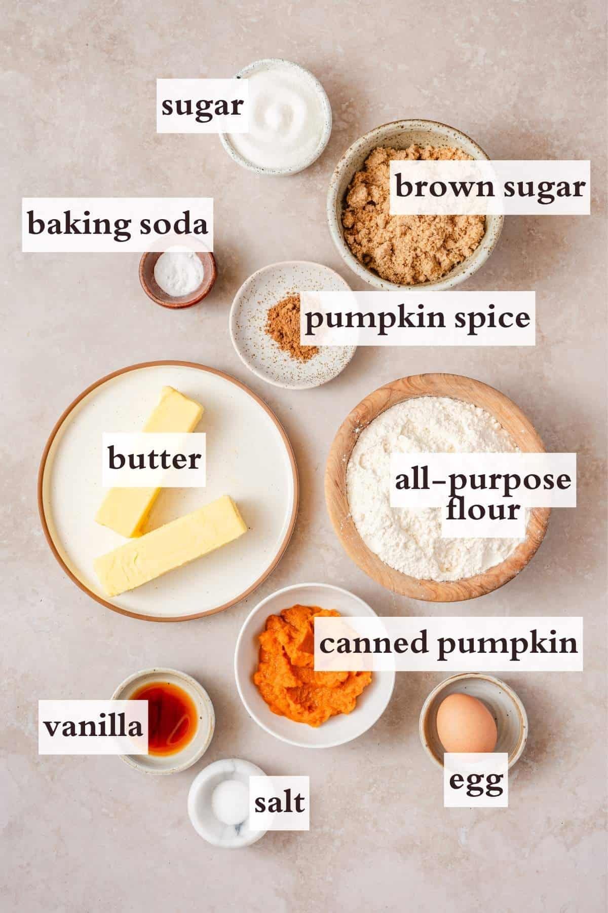 ingredients for chewy pumpkin cookies with text labels.